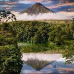 Reflection of Arenal Volcano In National Park Lake