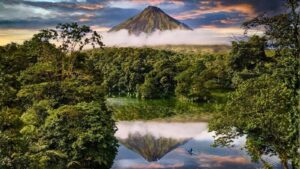 Reflection of Arenal Volcano In National Park Lake