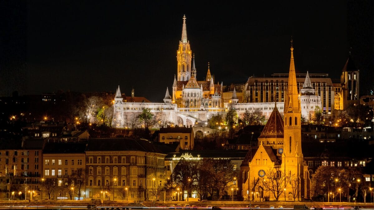 Illuminated Fisherman's Bastion at Night above the Danube River in Budapest, Hungary