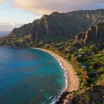 Hawaii travel package deals scenic coastline with turquoise waters and volcanic mountains