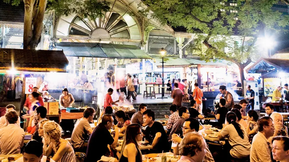 Hawker center food stalls in Singapore with diverse local cuisine options