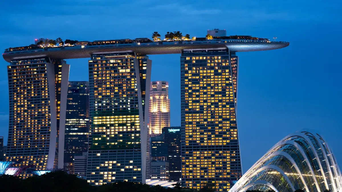 Marina Bay Sands hotel with infinity pool overlooking Singapore city skyline