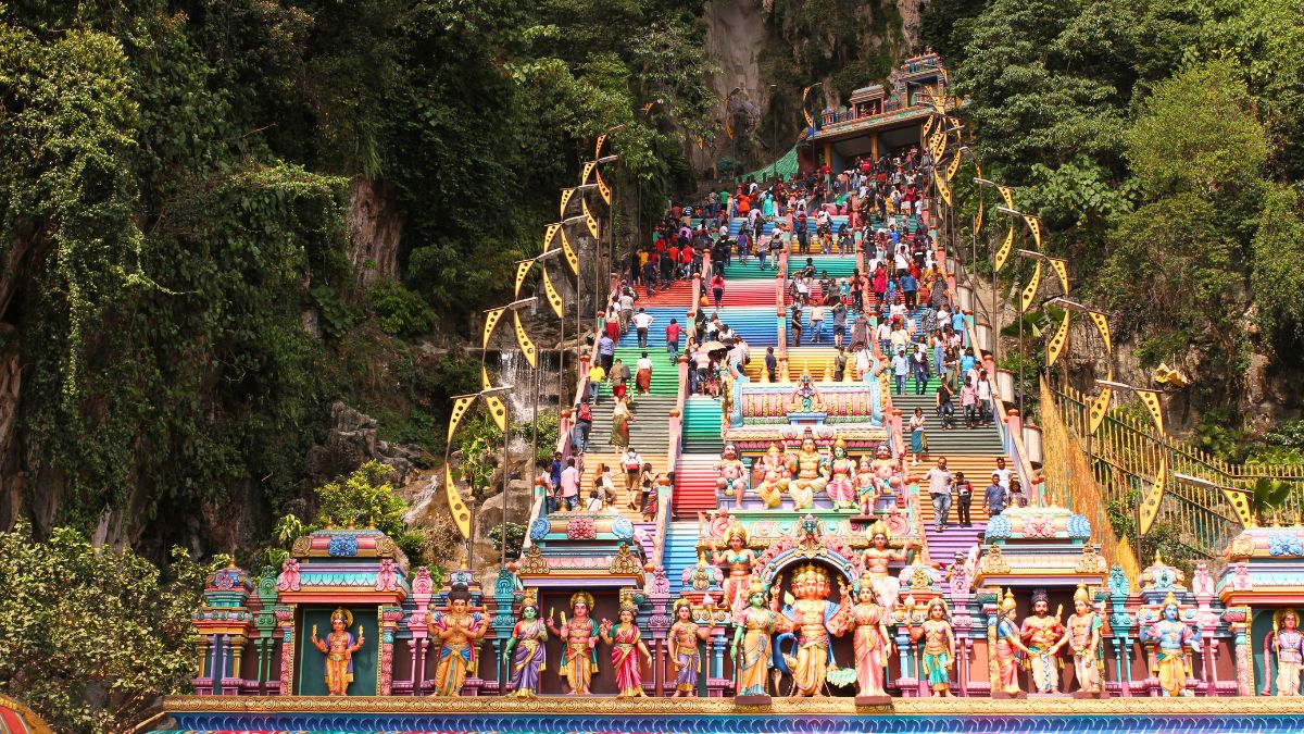 People climbing the 272 steps of Batu Caves - Batu Caves without the crowds