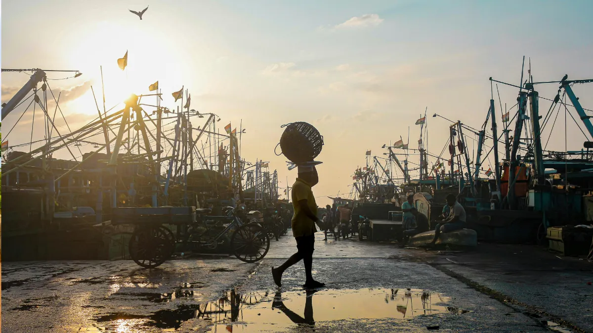 Indian Fisherman at Sunrise in Chennai Harbor