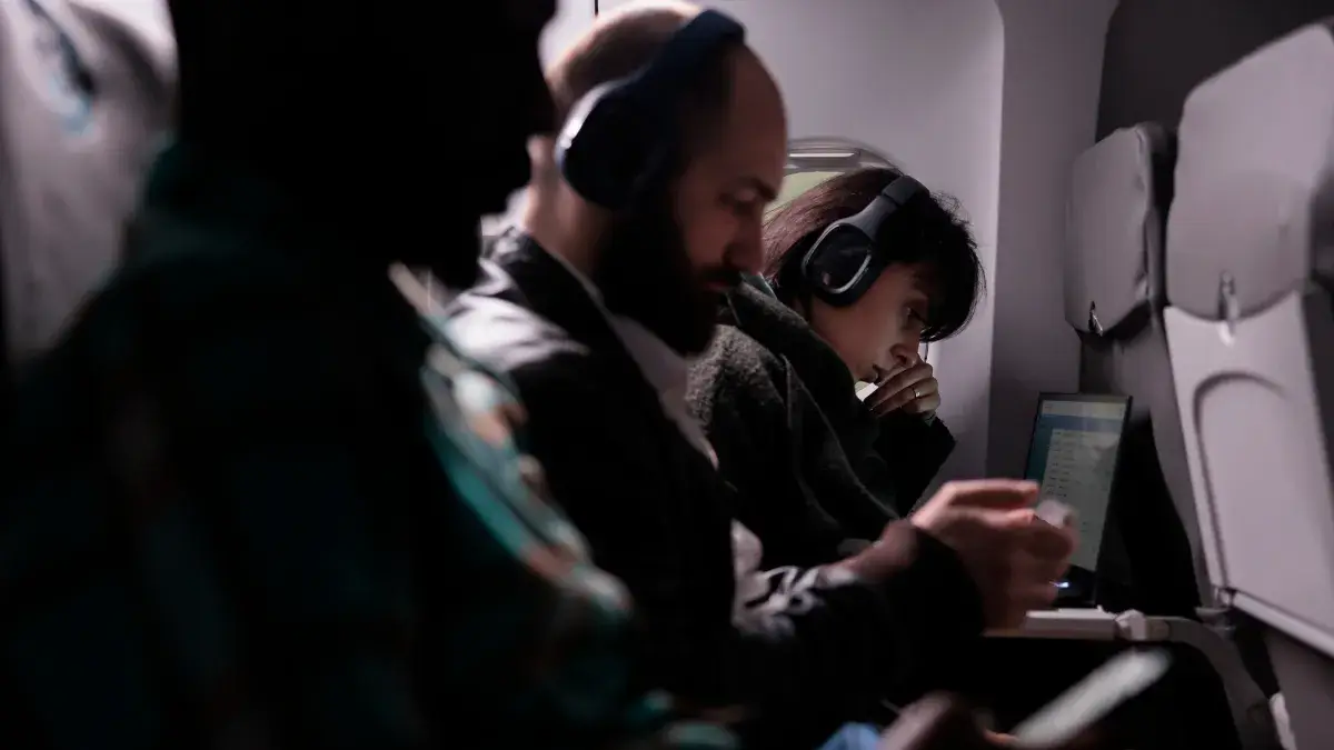Passengers traveling with headphones