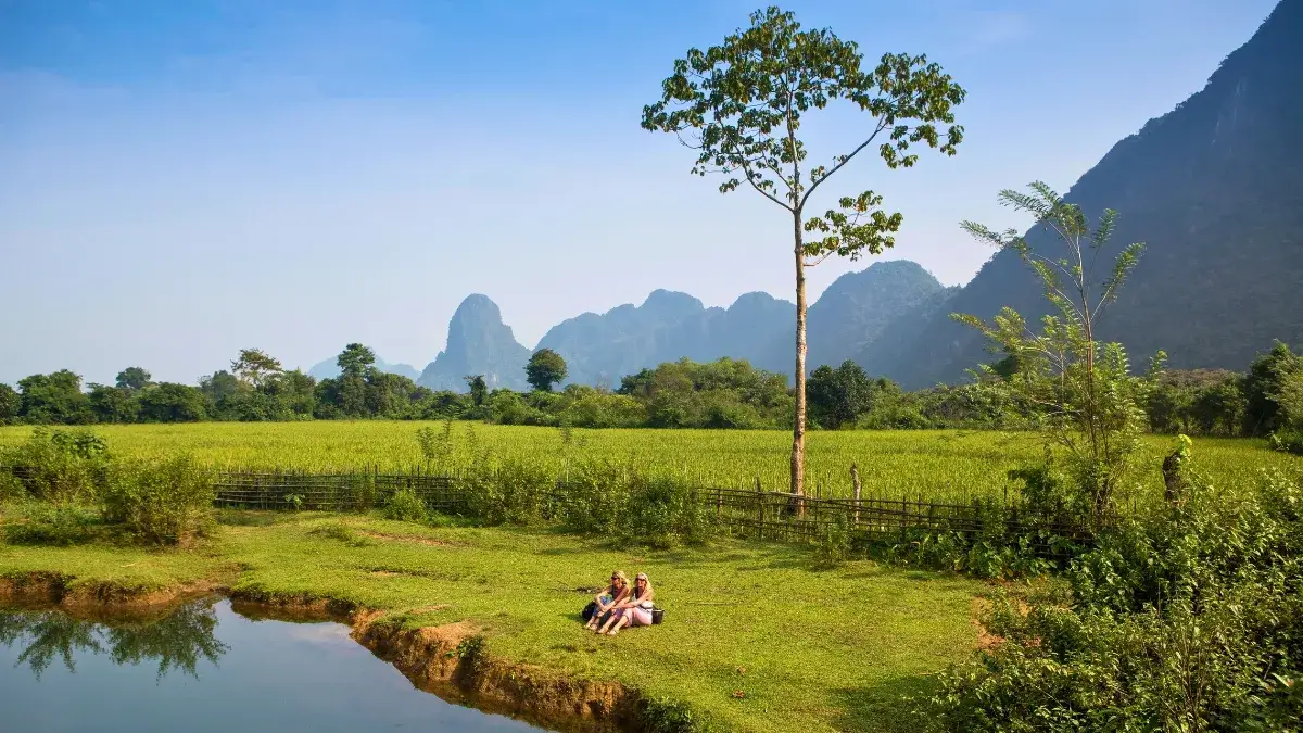 Relaxing beside Nam Song River, Laos