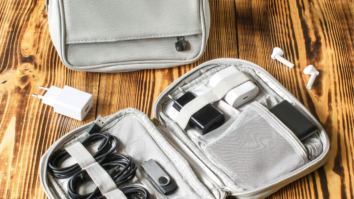 Travel tech earbuds, adapters and chargers