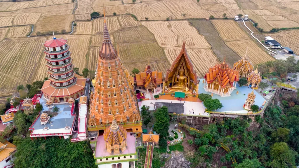 Sunrise on Golden Temple or Wat Tham Sua at Kanch